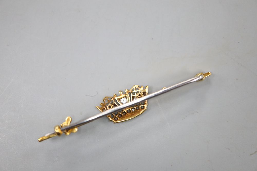 A 14ct, plat and diamond set coronet sweethearts bar brooch, 49mm, gross 3.7 grams, in Gieves box.